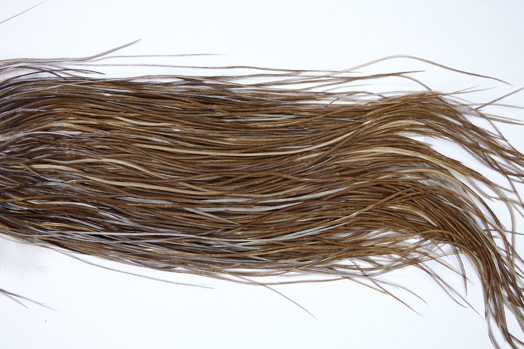 1863 Heritage Dry Fly Hackle, 2 Grade Rooster Saddle Heritage Dry Fly Hackle, Dun Ties Size 14-16