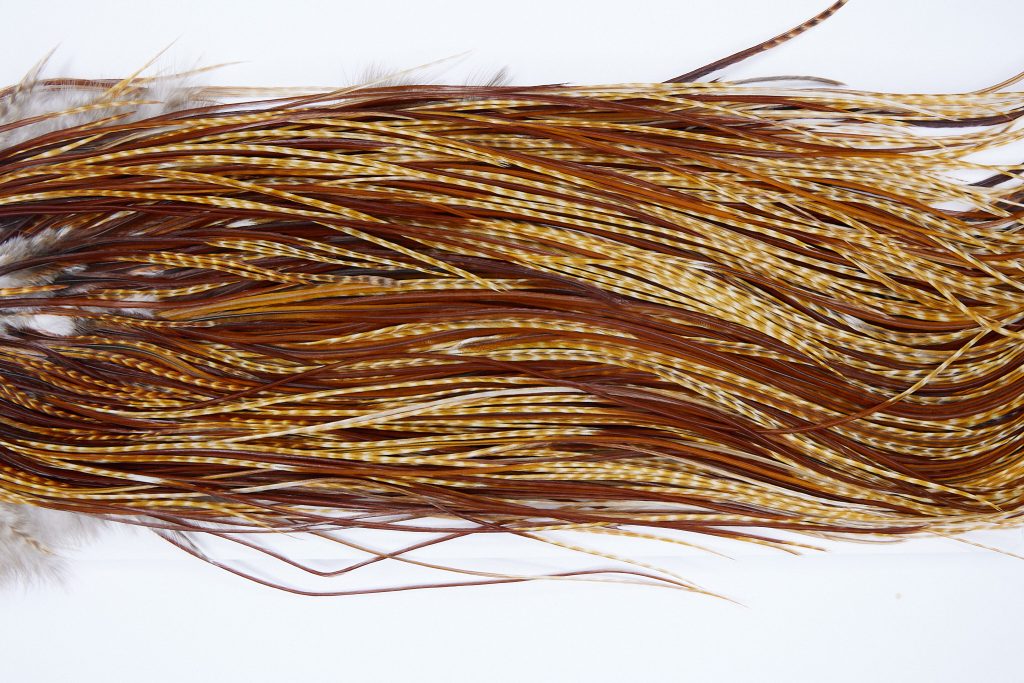 1928 Heritage Dry Fly Hackle, 2 Grade Rooster Saddle Barred Ginger Ties Size 14-16