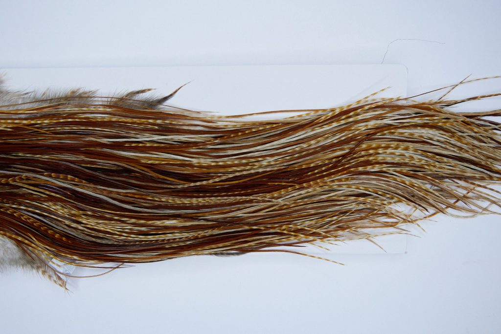 1987 Heritage Dry Fly Hackle, 3 Grade Rooster Saddle Barred Ginger Ties Size 16-18